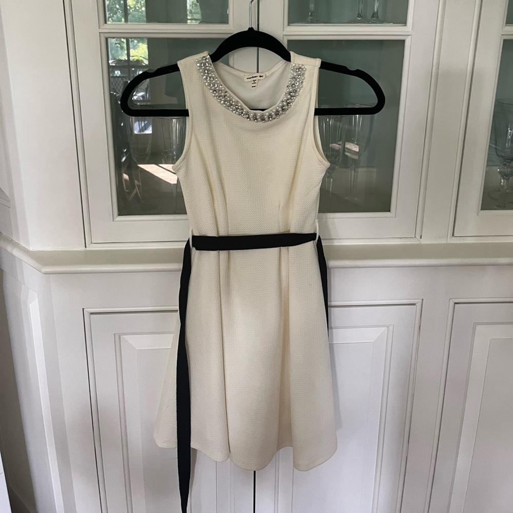 Girls beaded collor dress.